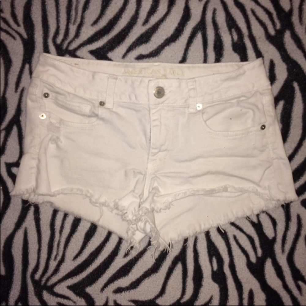 White distressed shorts